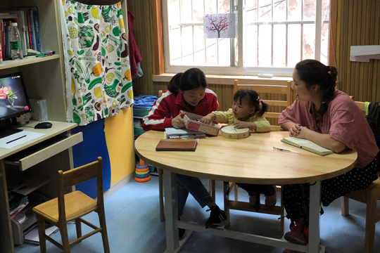 One-on-one therapy for a child with cochlear implants in China.