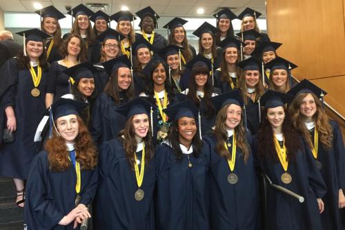 Class of 2016 group photo in graduation gowns